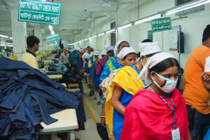 Photo of workers leaving a factory during a safety drill. 