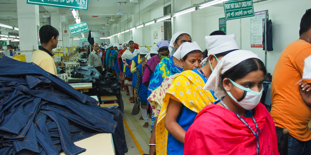 workers leaving factory during safety drill.